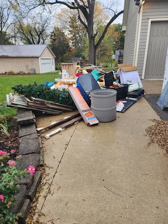 Dumpster being loaded with debris for Residential Dumpster Rental in Pequea